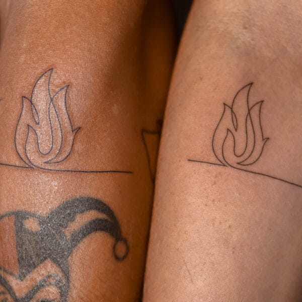 Matching Fire Flame Tattoo on Forearm