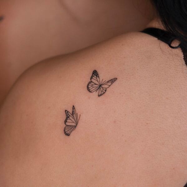 Mother and Daughter Matching Tattoos of Butterflies on Back