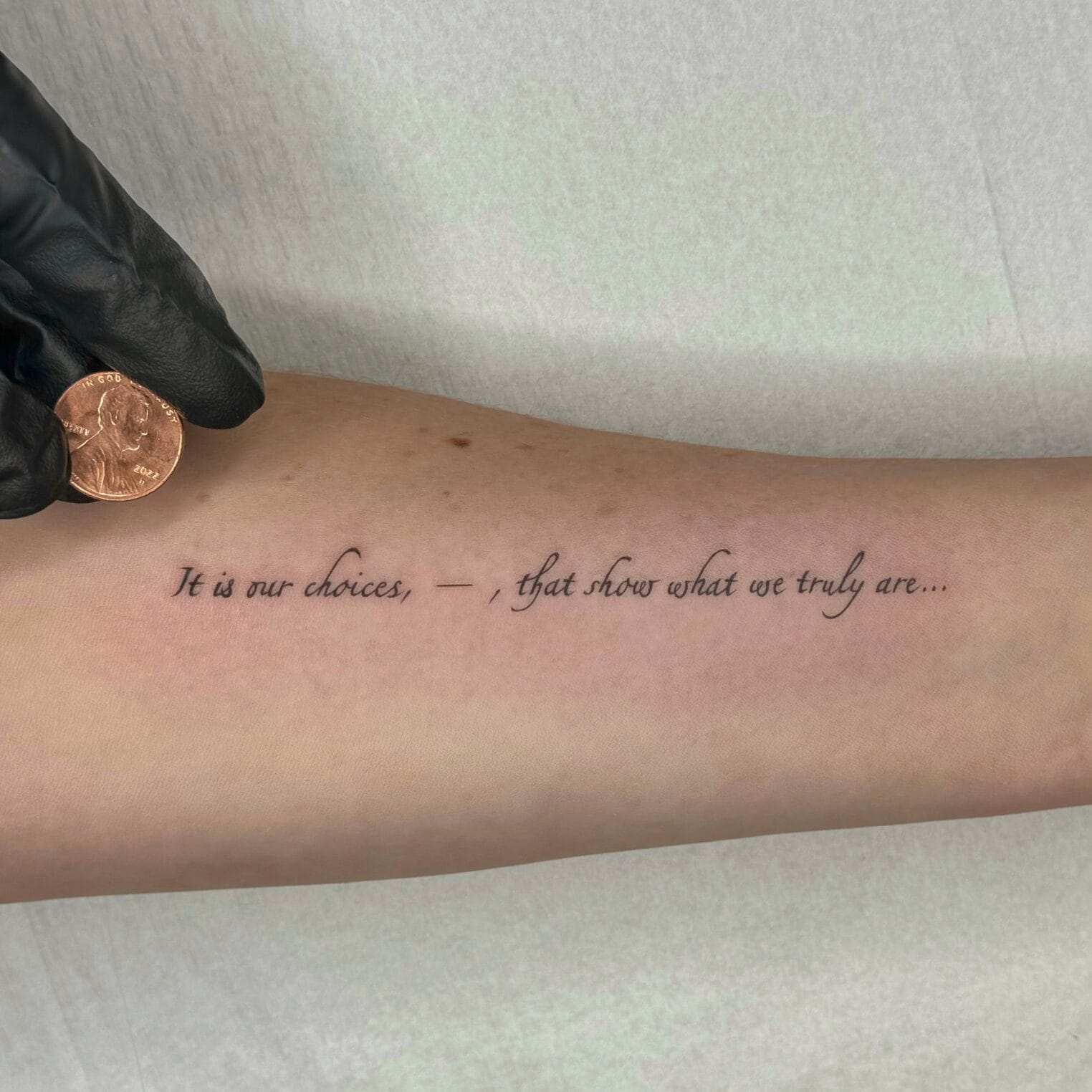 Precise Script Tattoo on Forearm
