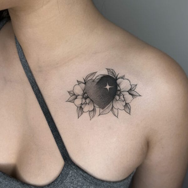 Gently Shaded Heart Tattoo On Collarbone