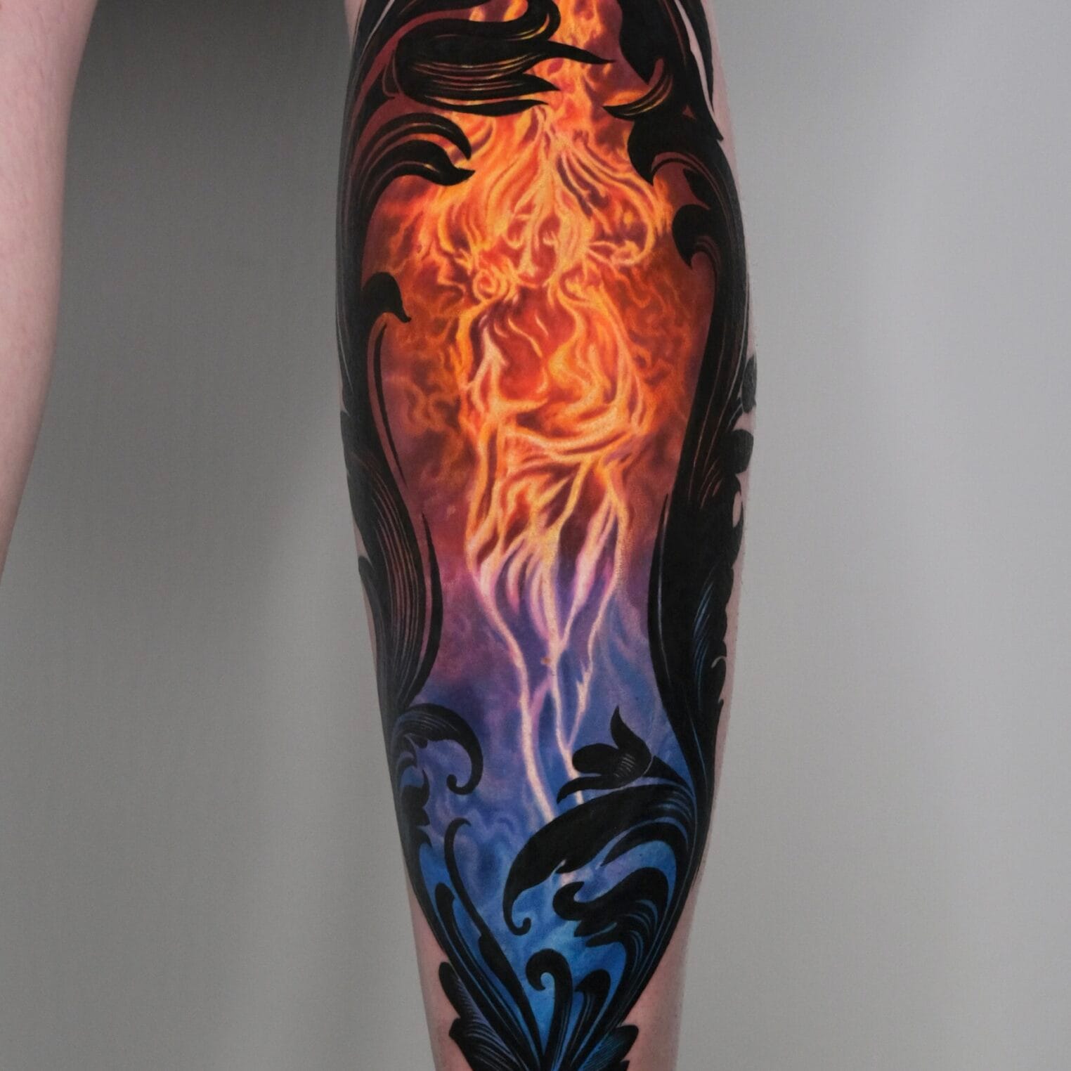 Esmeralda Tattoo on Lower Leg In Fire Appearance