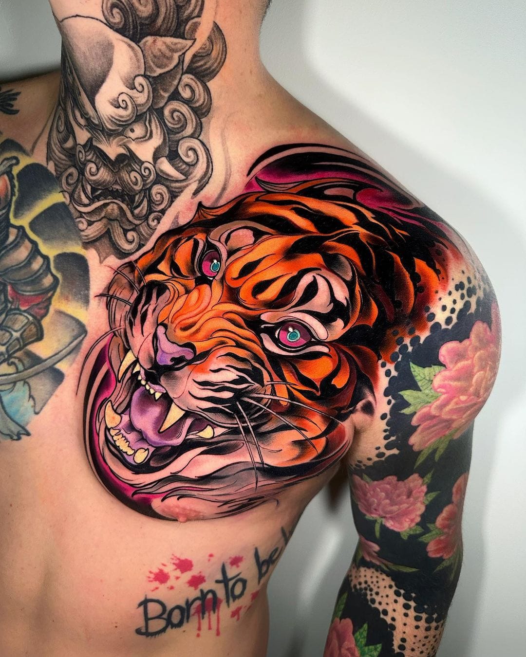 Vibrant Tiger Tattoo on Chest in Neo Traditional Style