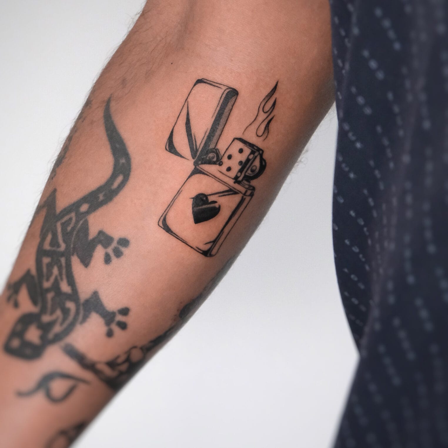 Zippo Lighter Tattoo on Forearm