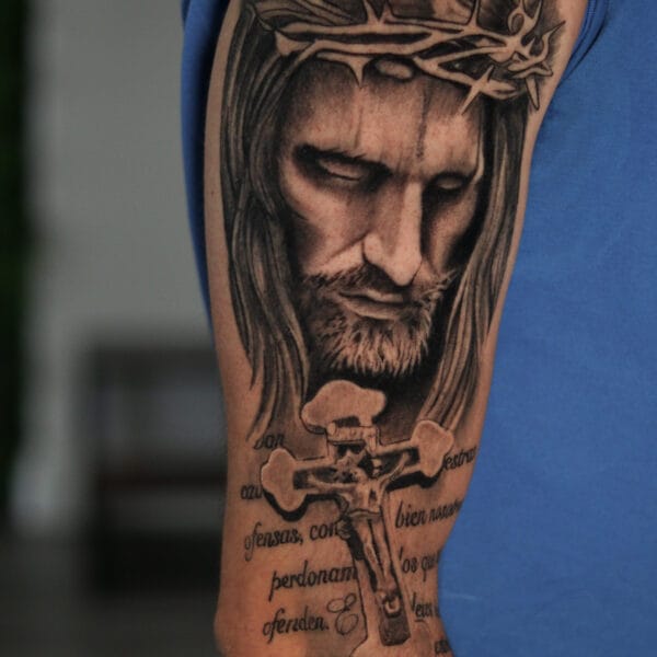 Religious Tattoo on Upper Arm
