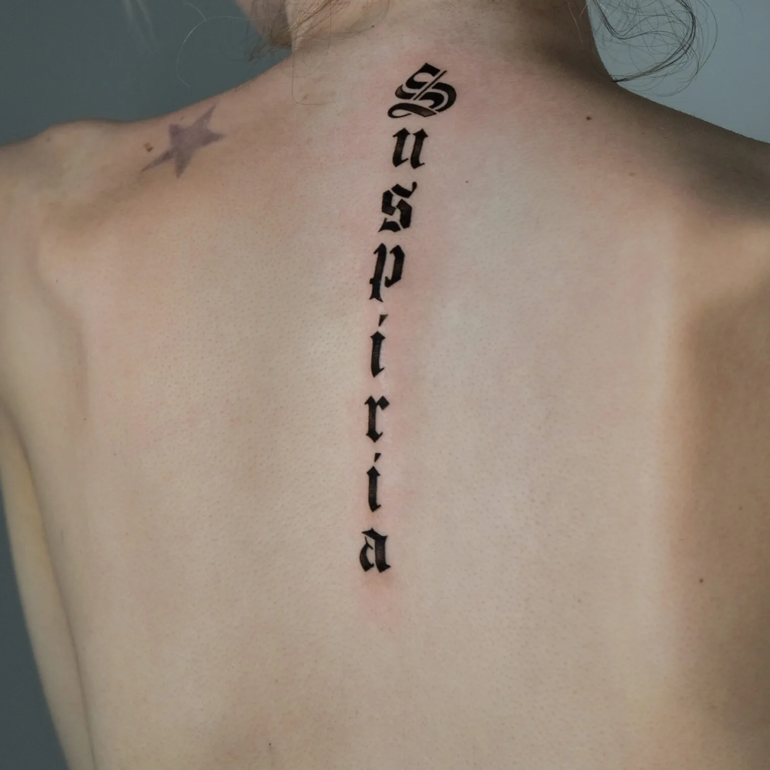 Script Tattoo on Spine - Best tattoo shop in Los Angeles - Art Collector  Tattoo Studio, image size:1524x1524