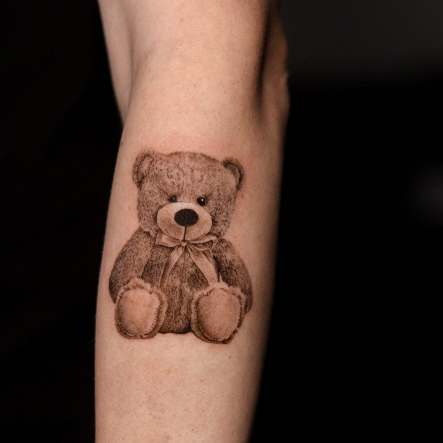 Small Realistic Teddy Bear Tattoo on Forearm