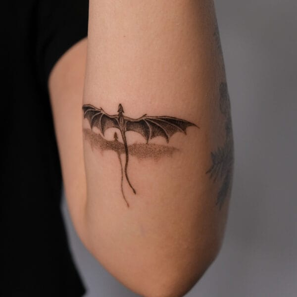 Small Flying Dragon Tattoo with 3D Effect on Forearm