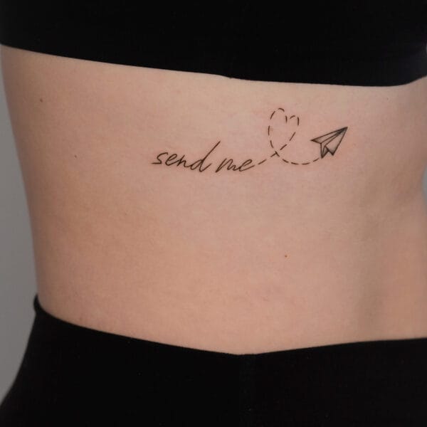 Script Tattoo on Ribs With a Paper Plane