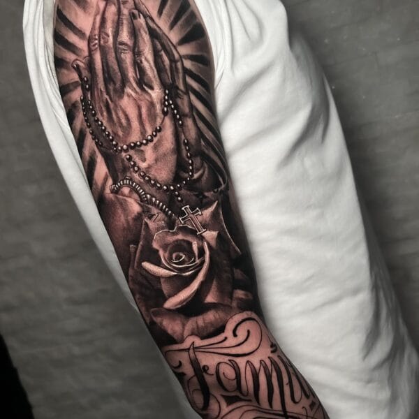 Sleeve Tattoo of Praying Hands, Cross, and Roses