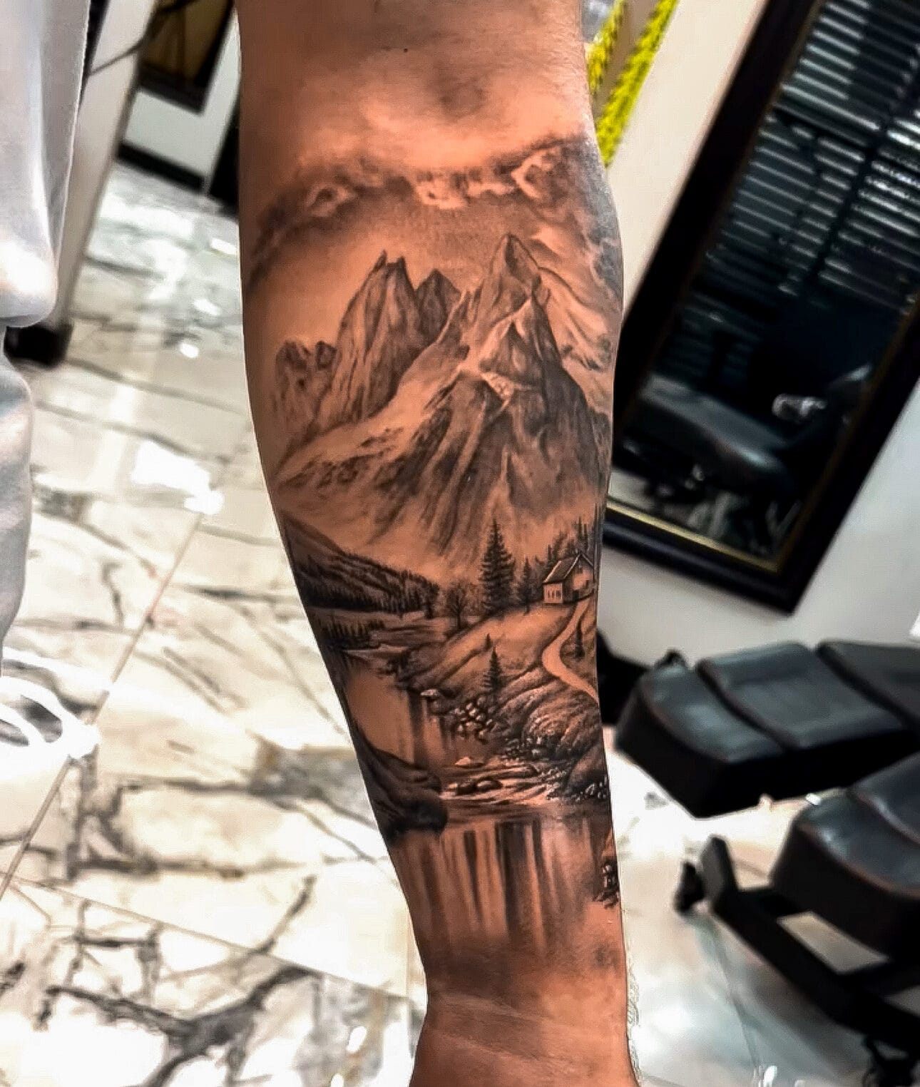 Realistic Nature Scene Tattoo on Forearm