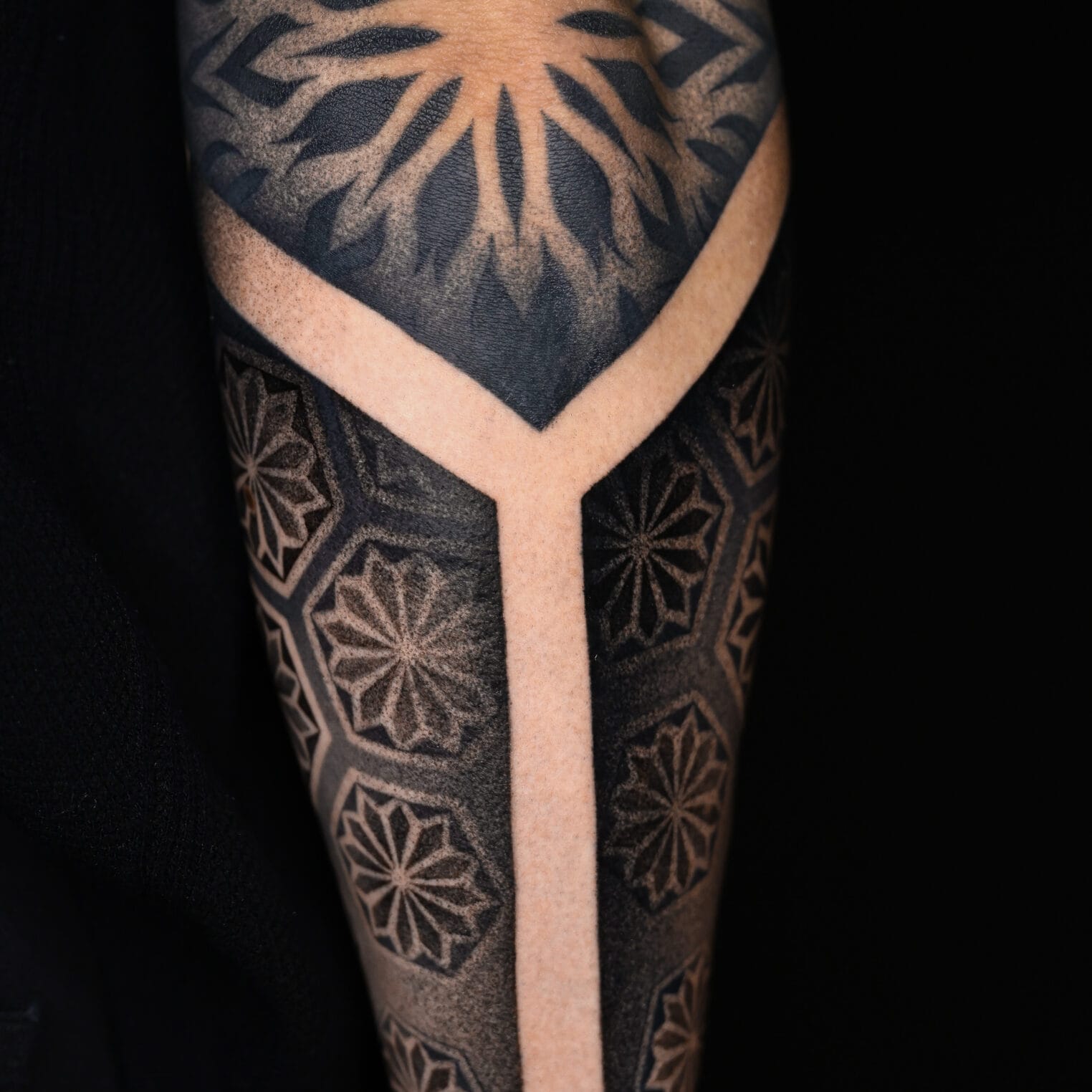 Ornamental Half-Sleeve Tattoo on Forearm