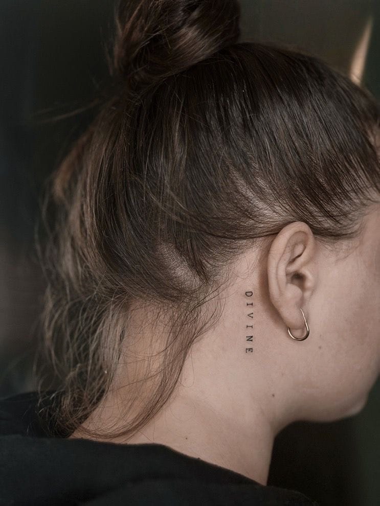 Script Tattoo Behind the Ear