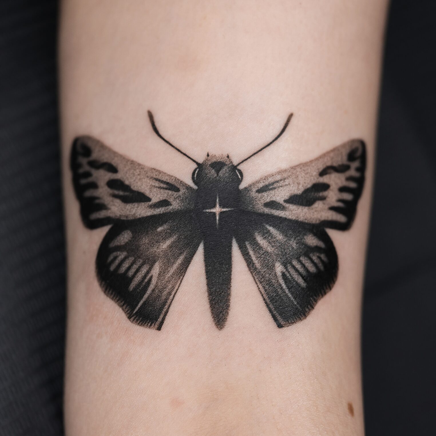 Elegant Butterfly Tattoo on Arm