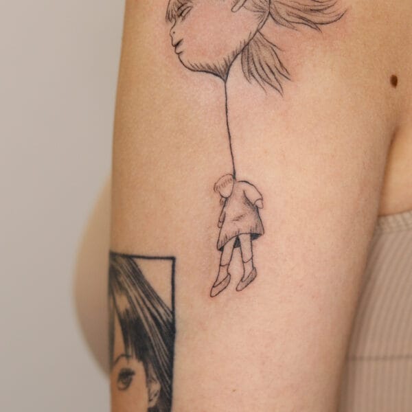 Surrealistic Girl with Bubble Head Tattoo