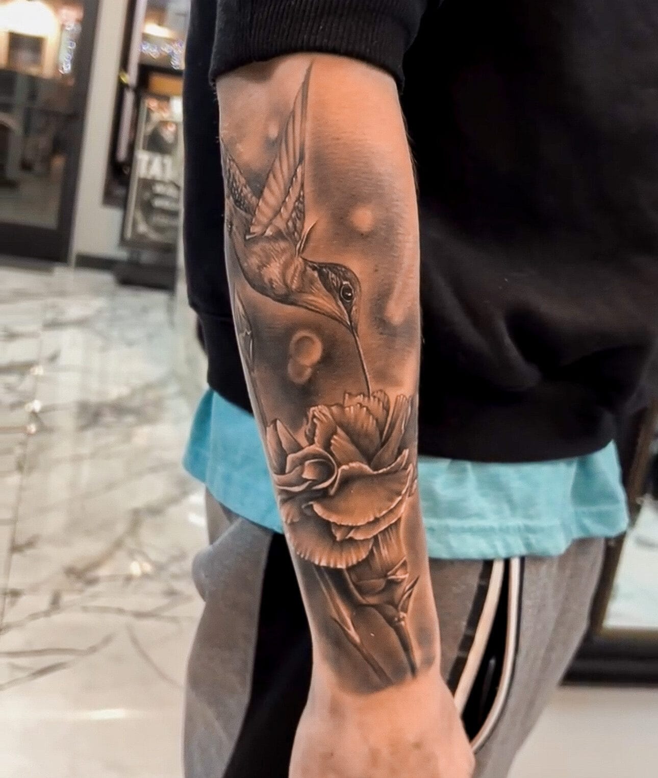 Black and Gray Hummingbird Tattoo on Forearm