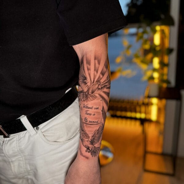 Letter and Dove Tattoo on Forearm