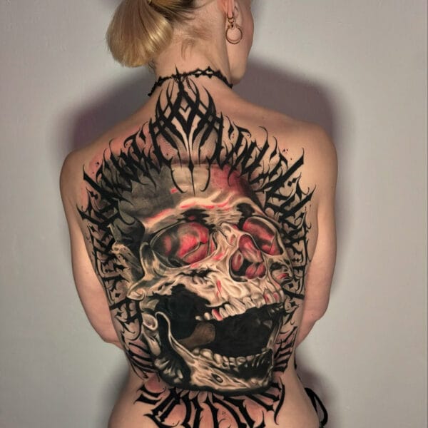Full Back Tattoo with Skull and Dark Lettering