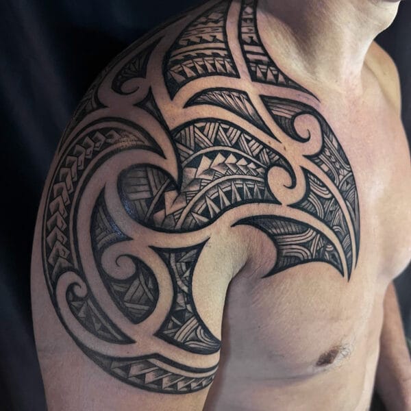 Polynesian Tribal Tattoo on Chest and Shoulder