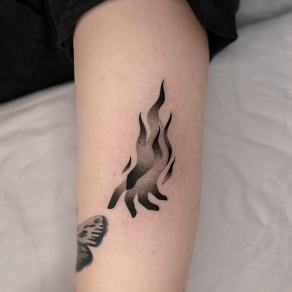 Surreal Reaching Hand Tattoo