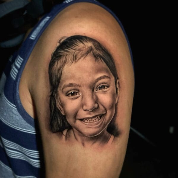 Realistic Child Portrait on Upper Arm