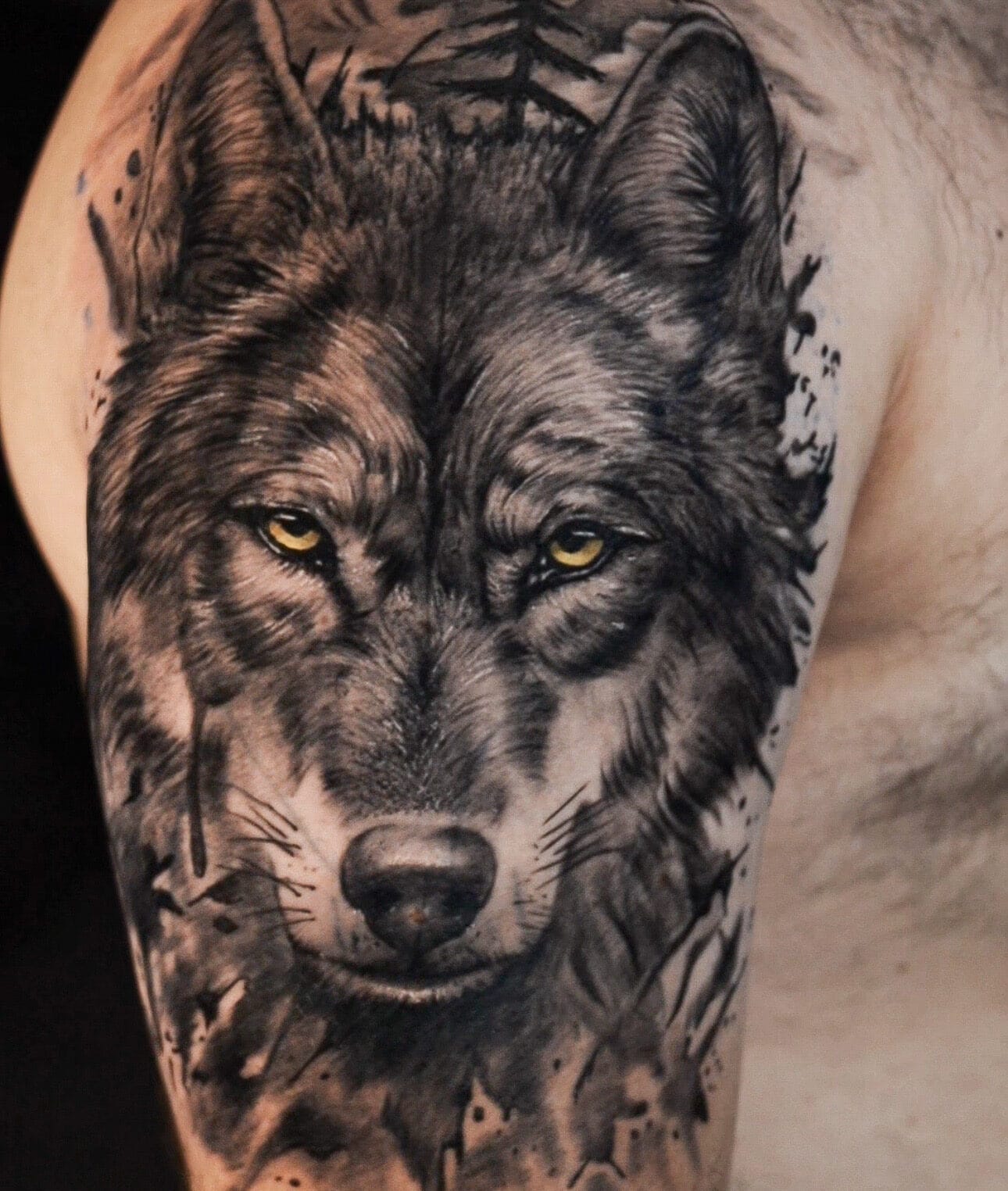 Wolf Tattoo with Colored Eyes on Upper Arm