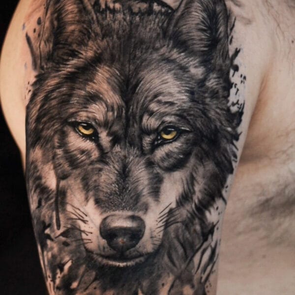 Wolf Tattoo with Colored Eyes on Upper Arm