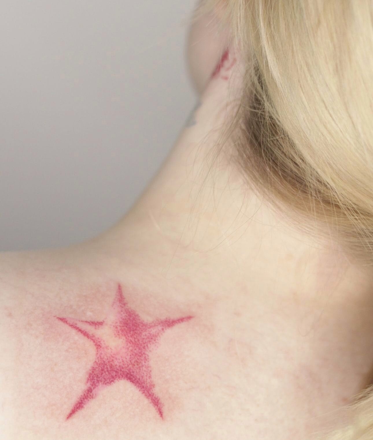 JoJo Birthmark Tattoo on Upper Back