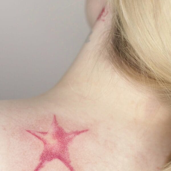 JoJo Birthmark Tattoo on Upper Back