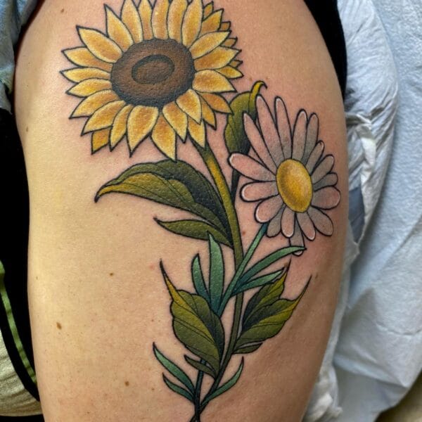 Vibrant Sunflower and Chamomile Tattoo on Upper Arm