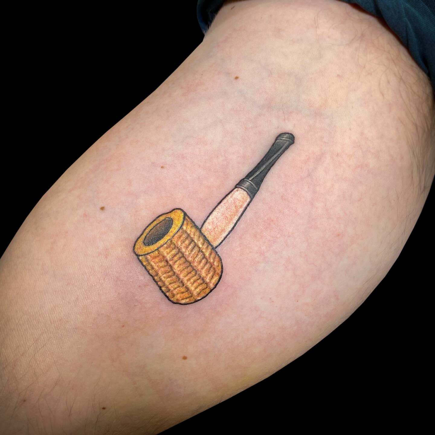 Small Corn Cob Pipe Tattoo on Inner Bicep