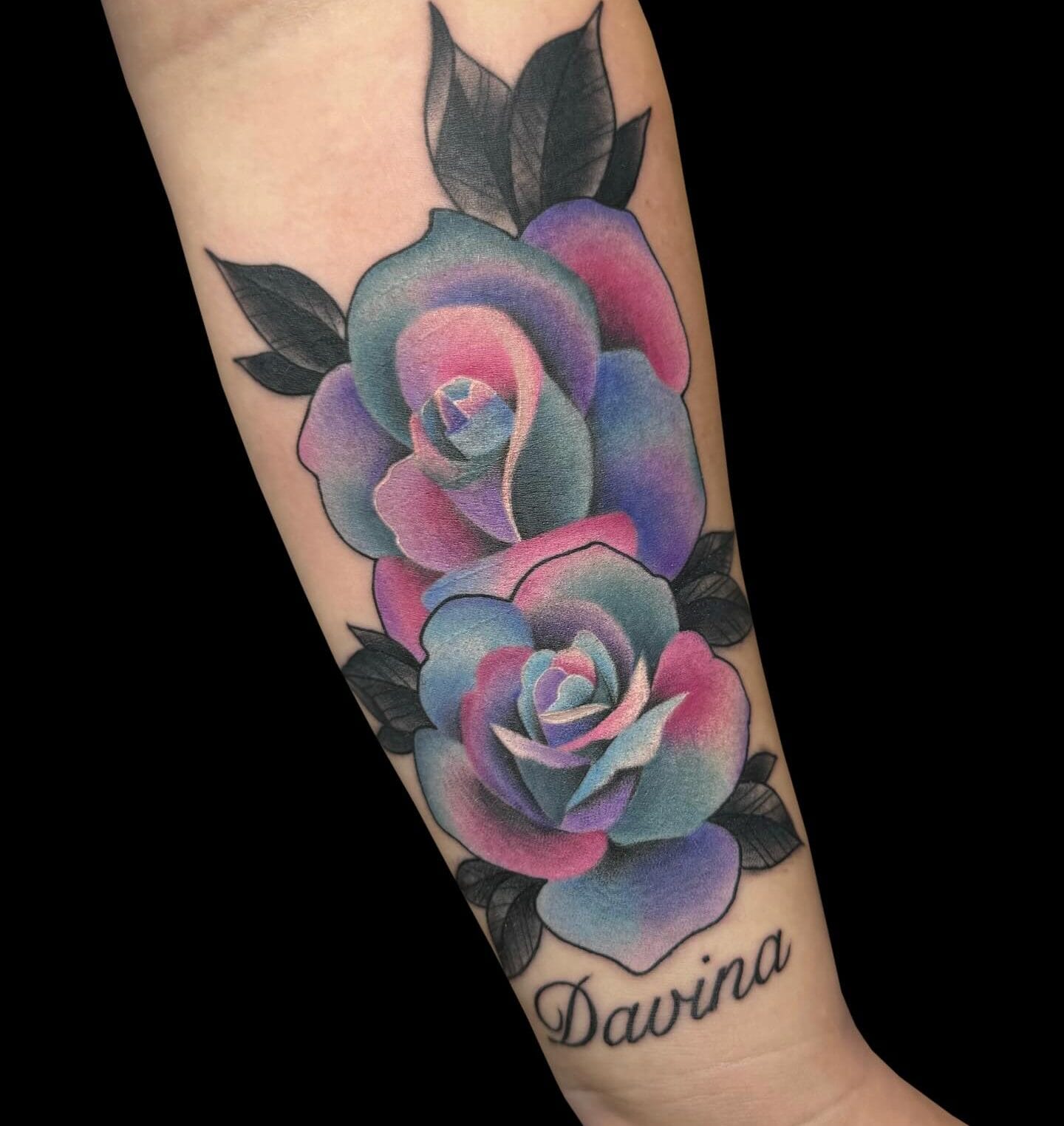 Vibrant Roses Tattoo on Forearm