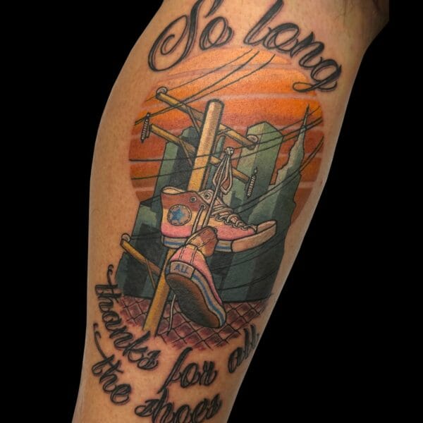 Urban Sunset Scene Tattoo on Lower Leg