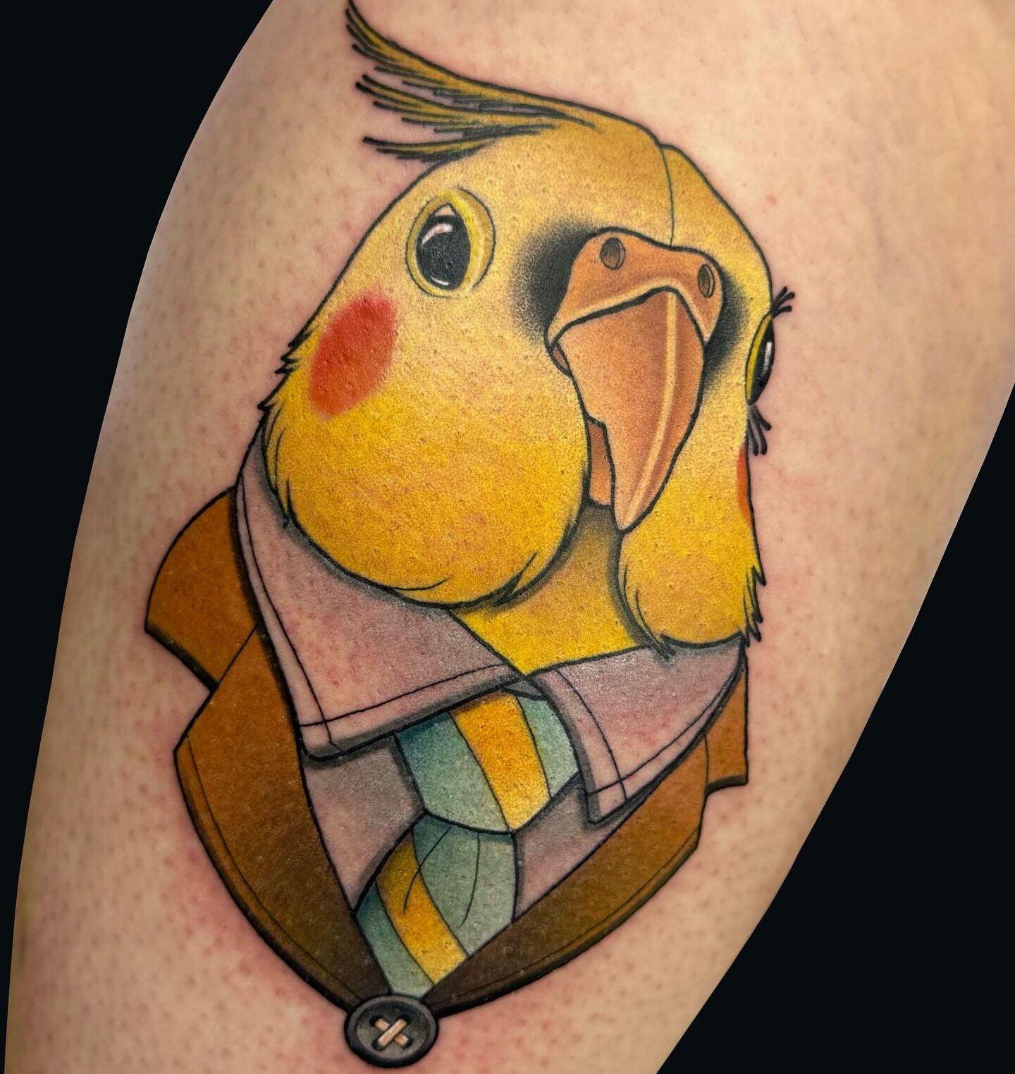Colorful Suit-Wearing Parrot Tattoo on Calf