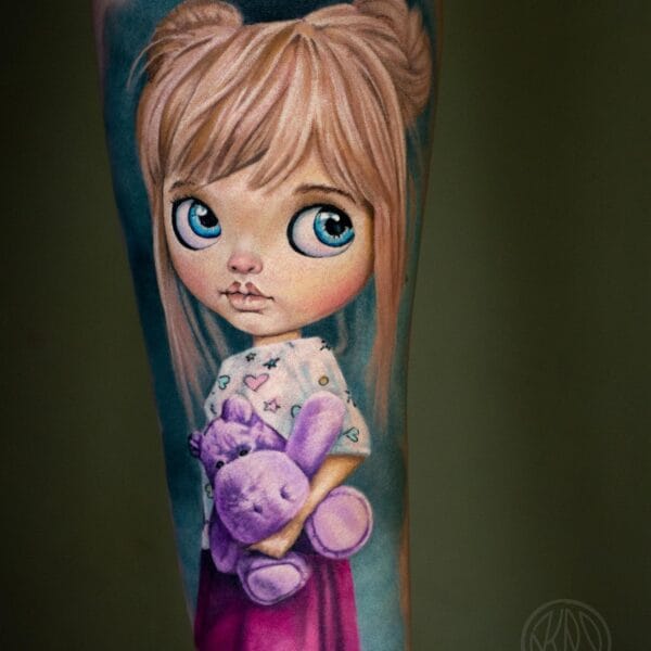 Realistic Doll Tattoo on Forearm