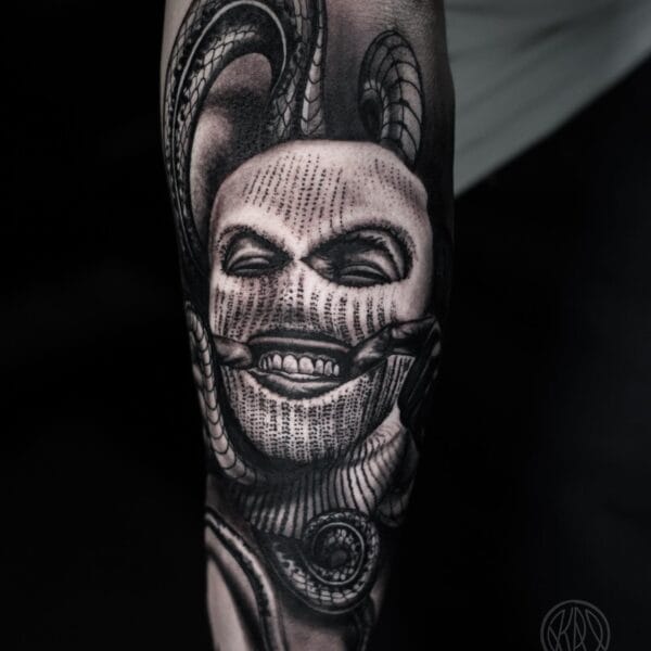 Ski Mask Tattoo with Snake on Forearm
