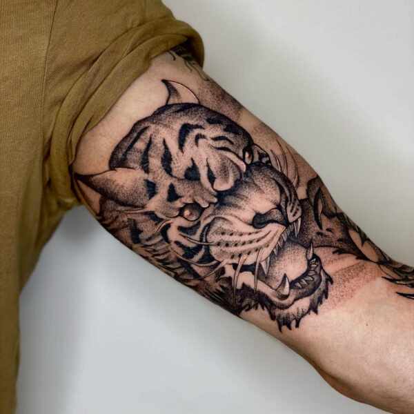 Black and Gray Tiger Tattoo on Biceps