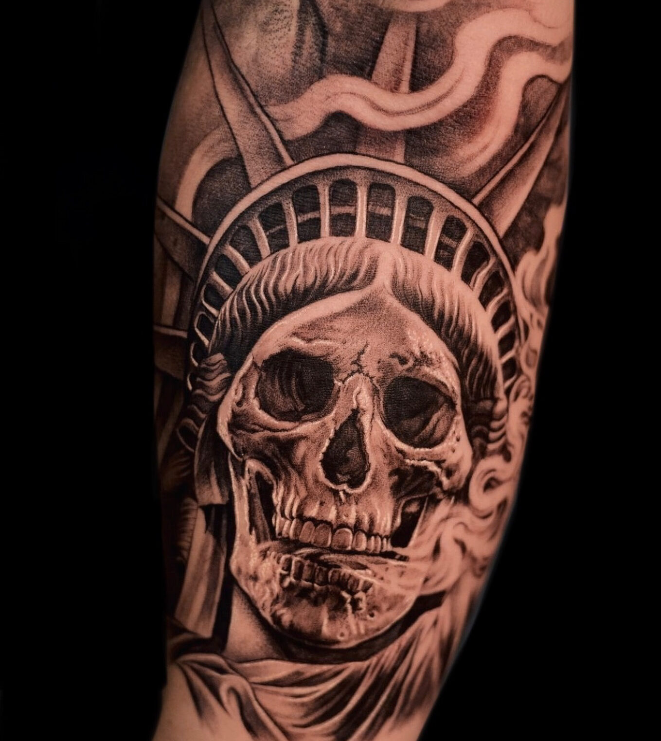 Skull Tattoo and Statue of Liberty on Forearm