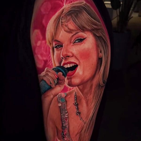 Taylor Swift Portrait Tattoo on Upper Arm
