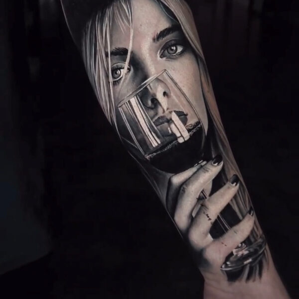 Black and Gray Realism Portrait on Forearm
