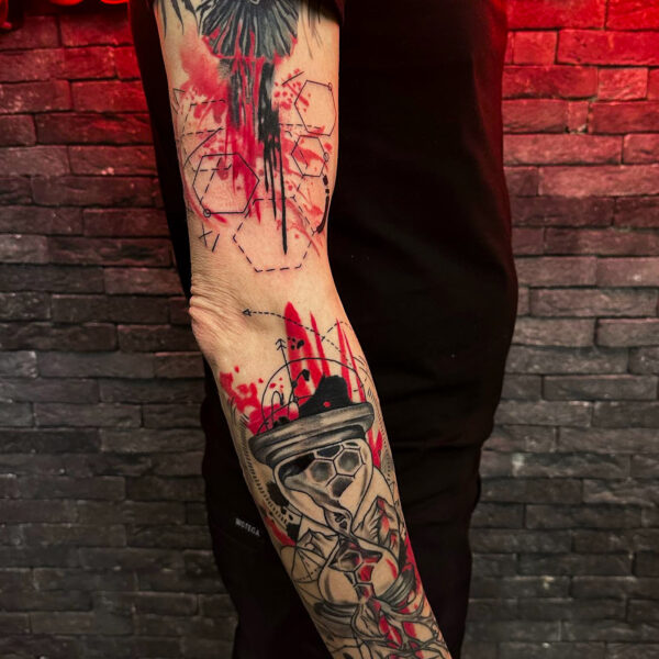 Trash Polka Inspired Sleeve Tattoo