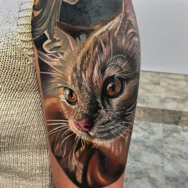 Realistic Cat Portrait Tattoo on Upper Arm