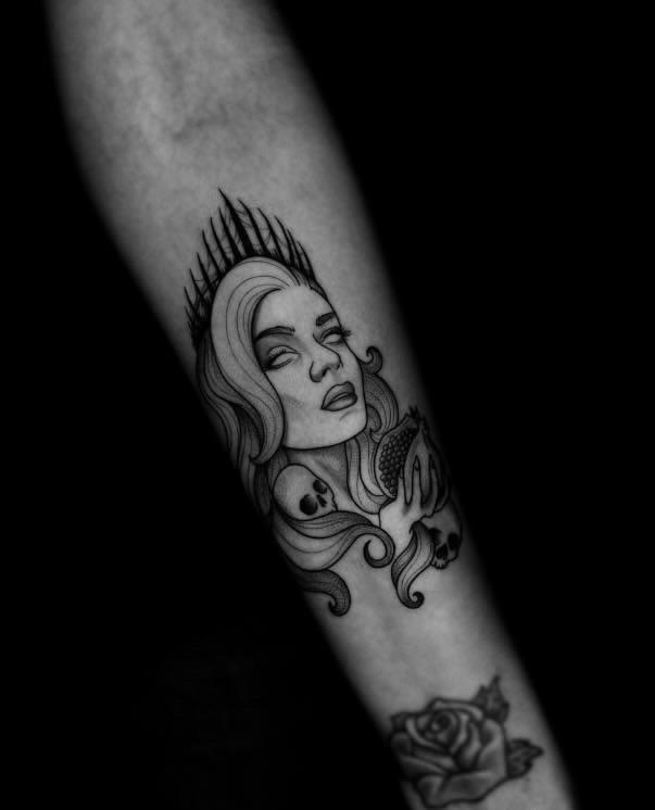 Mystical Witchy Woman Tattoo in Graphic Style on Forearm
