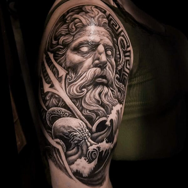 Poseidon Tattoo on Upper Arm in Black and Gray