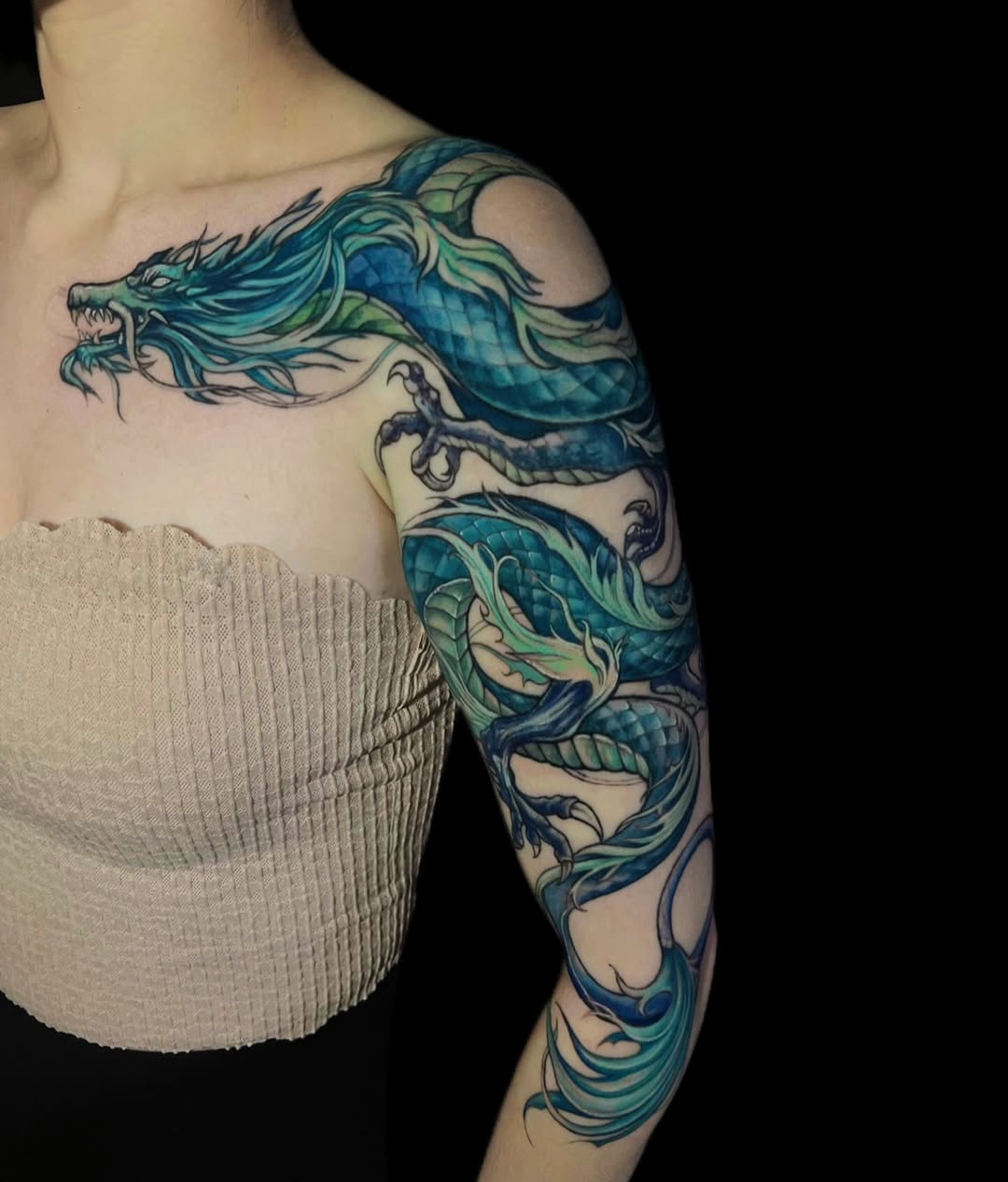 Emerald Green Dragon Tattoo Wrapping the Whole Arm