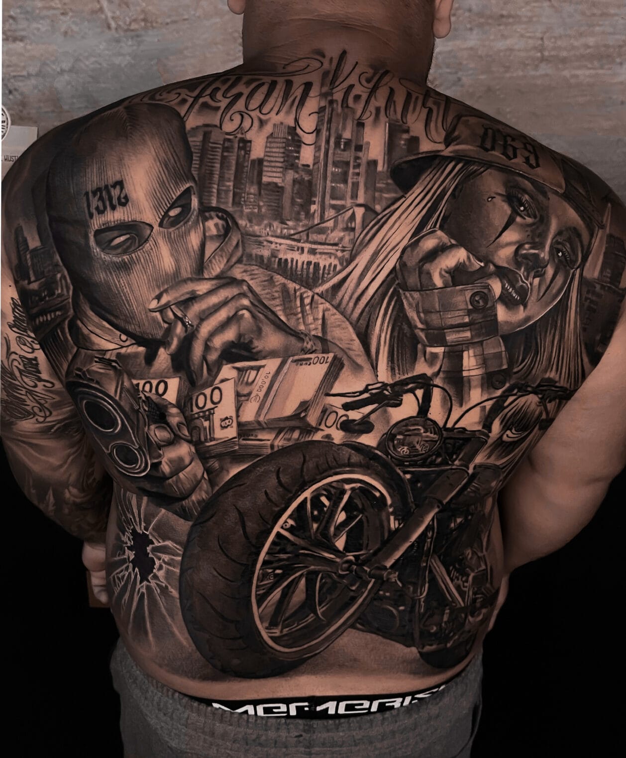 black and grey full back realism tattoo los angeles