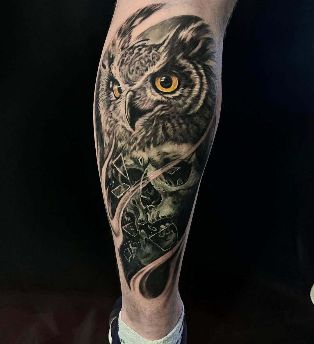 Black and Gray Owl and Skull Tattoo on Lower Leg