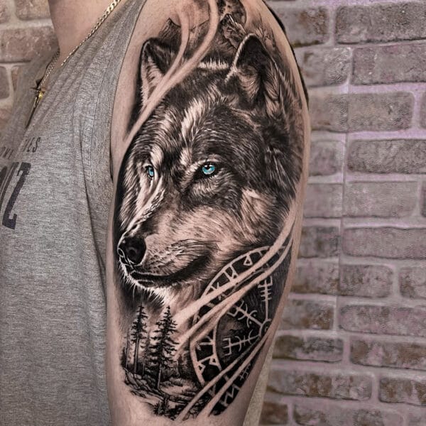 Wolf Tattoo on Upper Arm in Black and Gray