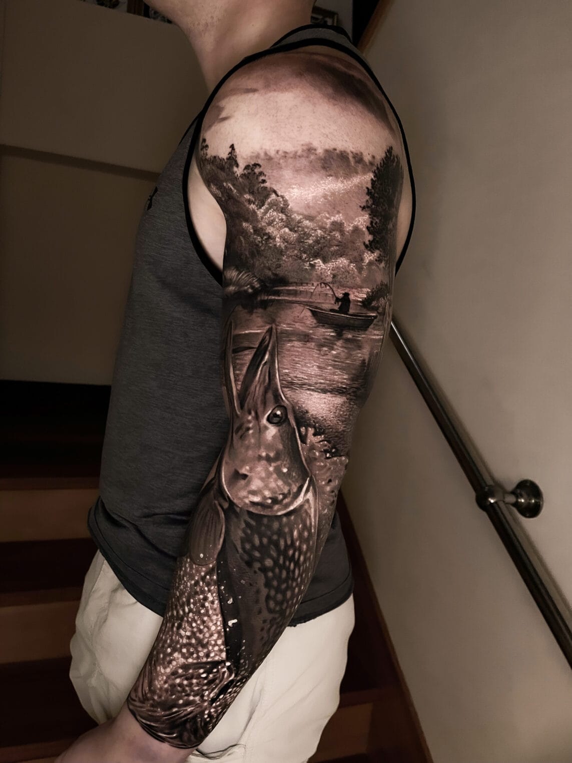 black and gray fisherman realism sleeve tattoo la