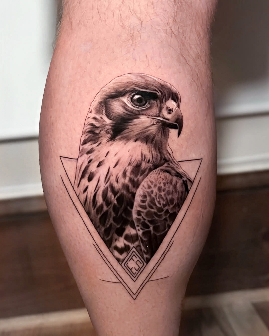 Falcon Tattoo with Triangle on Calf