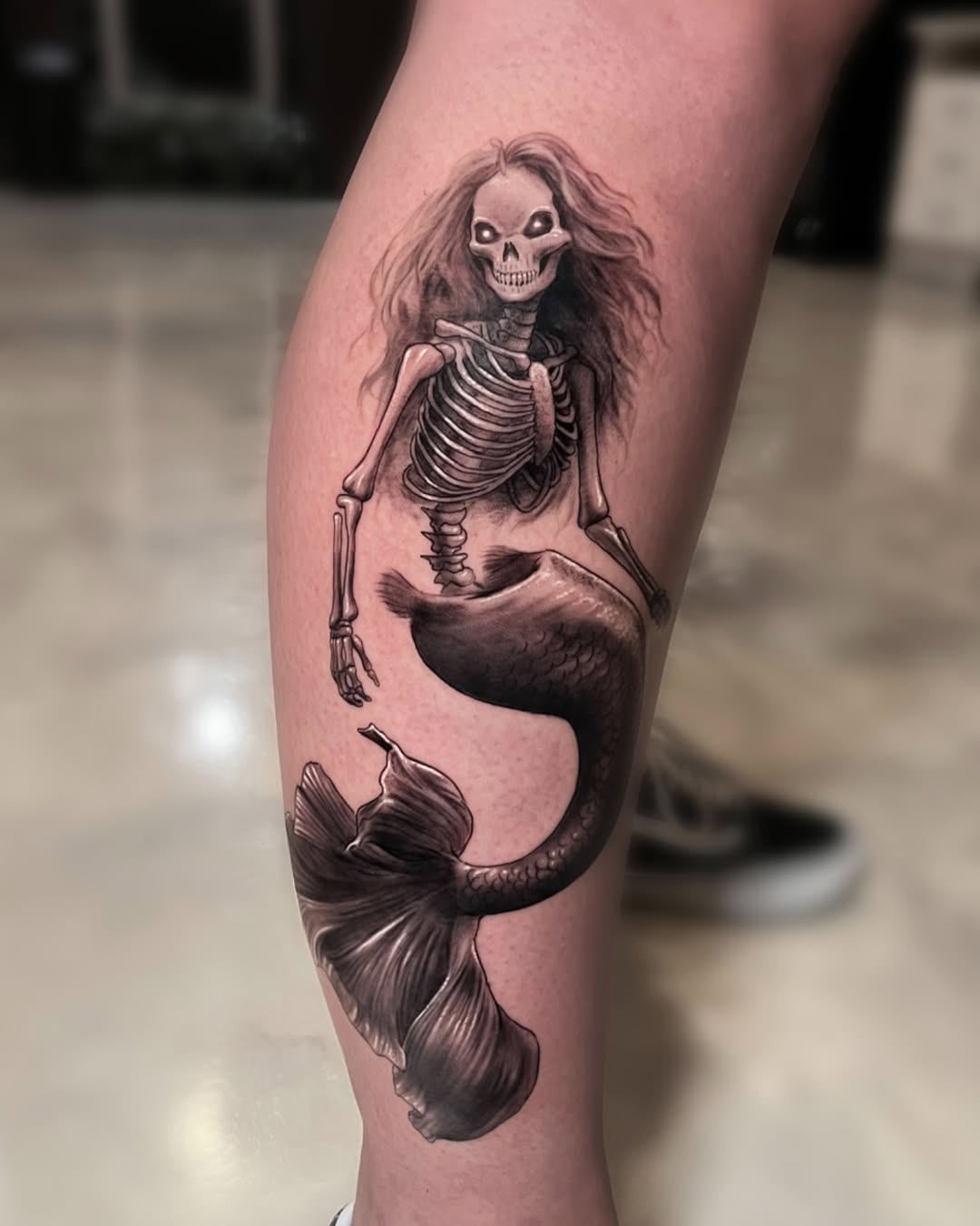 Spooky Black and Gray Mermaid Tattoo on Lower Leg